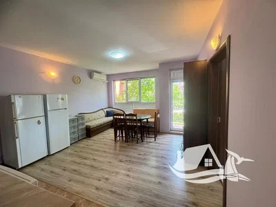 Kitchen; kitchen appliances, natural light, tile floor