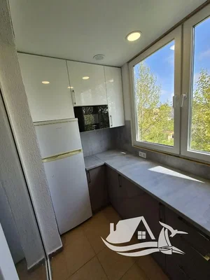 Kitchen; kitchen appliances, view, natural light, tile floor