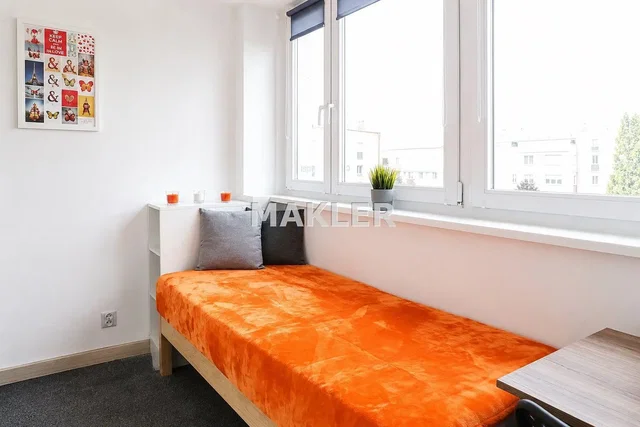 Slaapkamer; natuurlijk licht, houten vloer