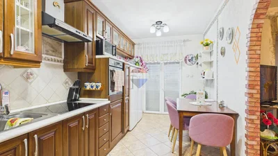 Kitchen; kitchen appliances, tile floor, natural light
