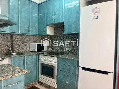 Kitchen; kitchen appliances, tile floor