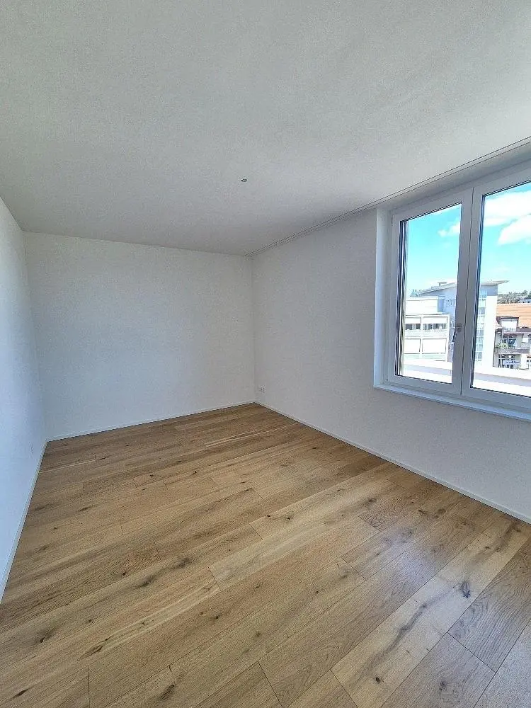 Bedroom; wood floor, natural light, needs renovation
