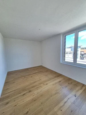 Bedroom; wood floor, natural light, needs renovation