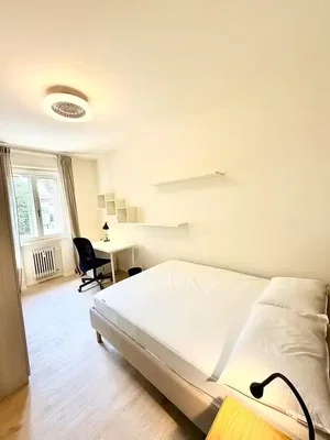 Slaapkamer; natuurlijk licht, houten vloer