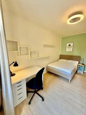 Slaapkamer; houten vloer, natuurlijk licht, moderne stijl