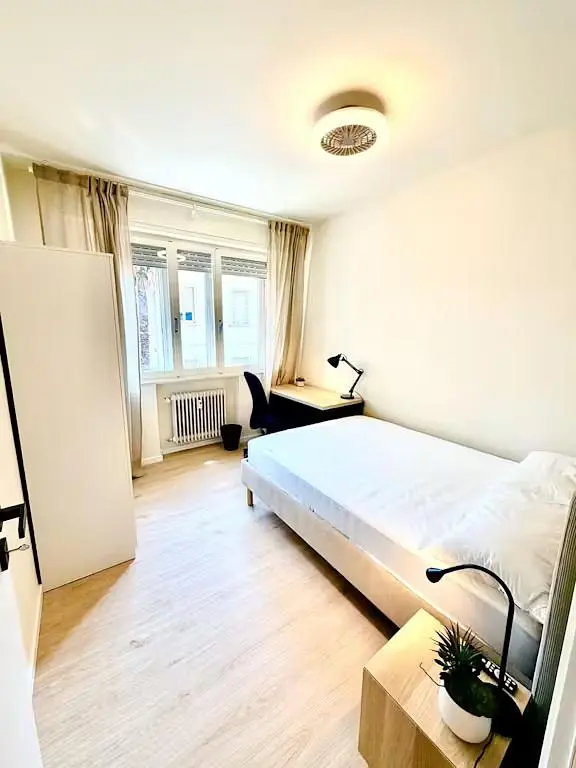 Bedroom; natural light, wood floor