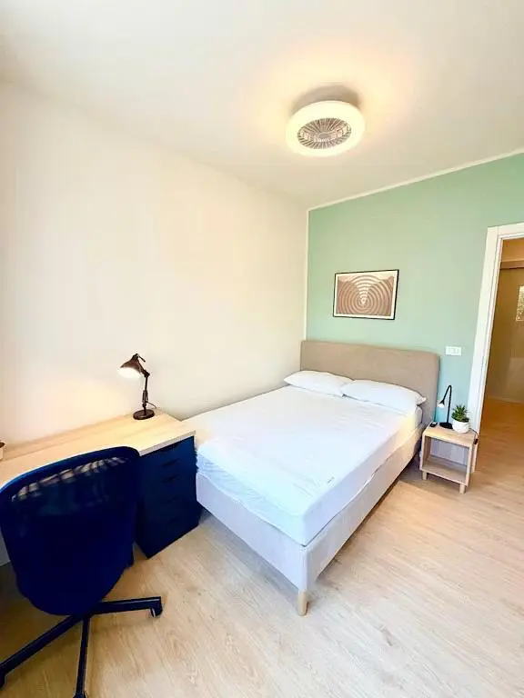 Bedroom; wood floor, natural light