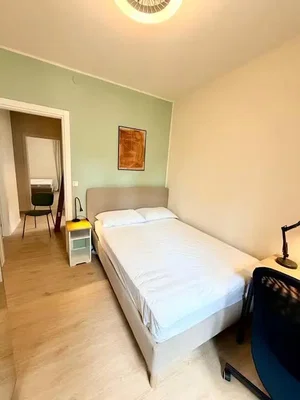 Bedroom; wood floor, natural light