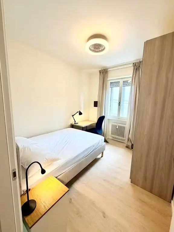 Bedroom; wood floor, natural light