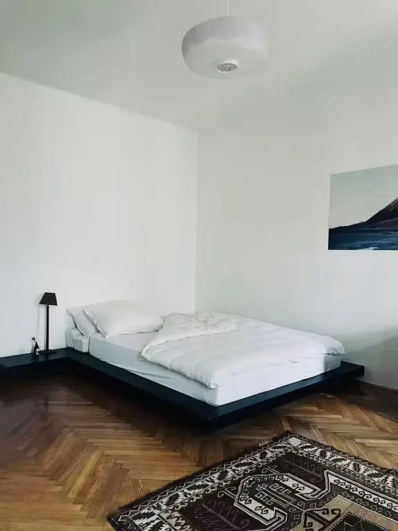Bedroom; wood floor, natural light