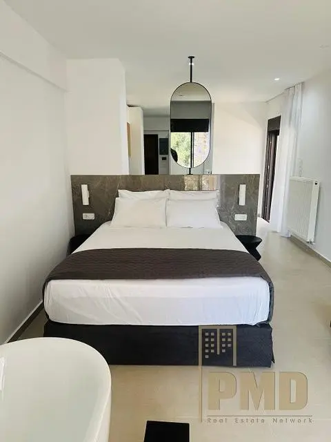 Bedroom; natural light, tile floor