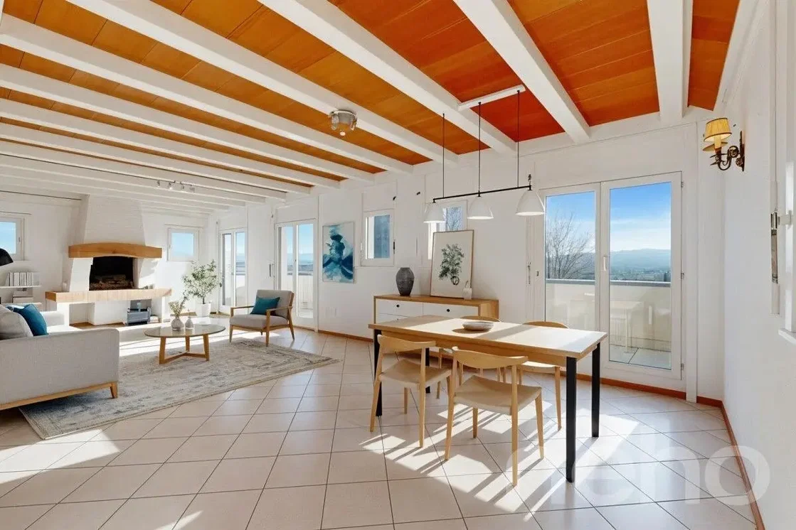 Soggiorno; pavimento in piastrelle, soffitti alti, travi in legno, camino, luce naturale, stile moderno