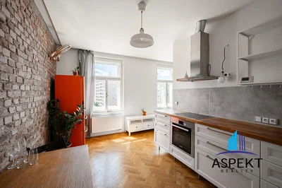 Kitchen; kitchen appliances, wood floor, natural light