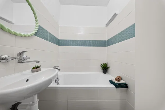 Bathroom; tile floor, renovated, natural light