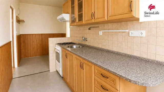 Kitchen; kitchen appliances, tile floor, natural light