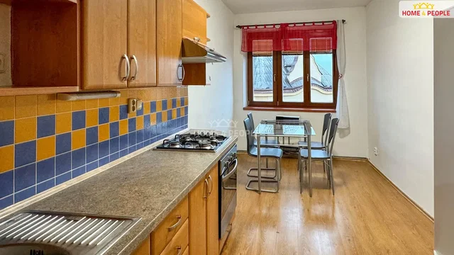 Kitchen; kitchen appliances, wood floor, tile floor, natural light
