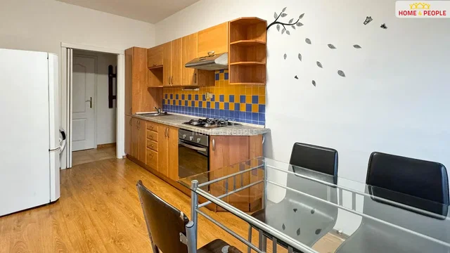 Kitchen; kitchen appliances, wood floor, natural light