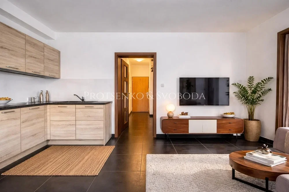 Living room; kitchen appliances, natural light, modern style, wood floor