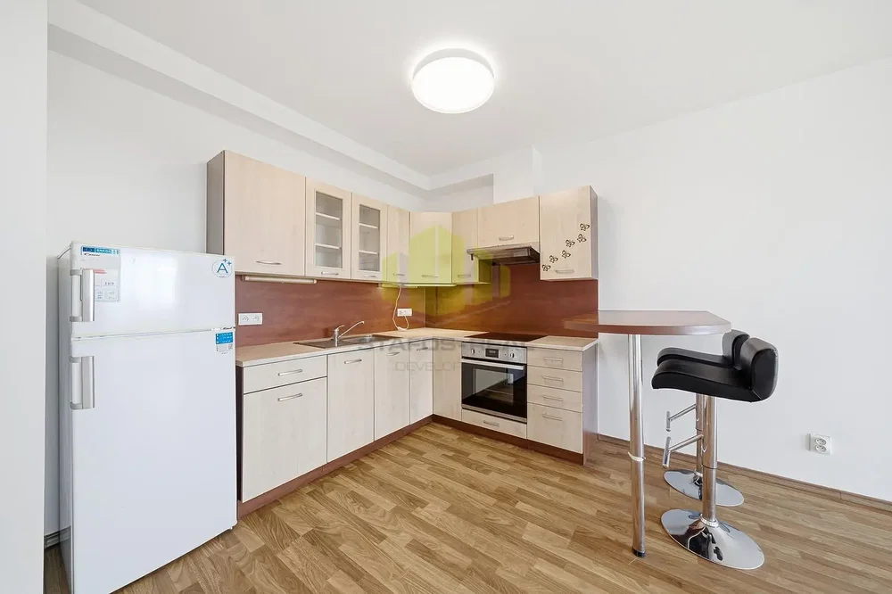 Kitchen; kitchen appliances, wood floor, natural light