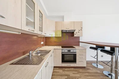 Kitchen; kitchen appliances, wood floor, natural light