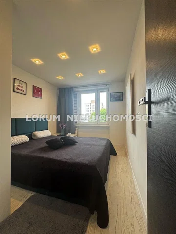 Bedroom; wood floor, natural light