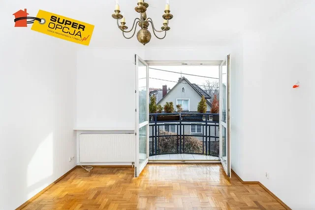 Balcony; wood floor, natural light, view