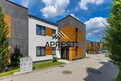 Salon; podłoga drewniana, światło dzienne, styl nowoczesny