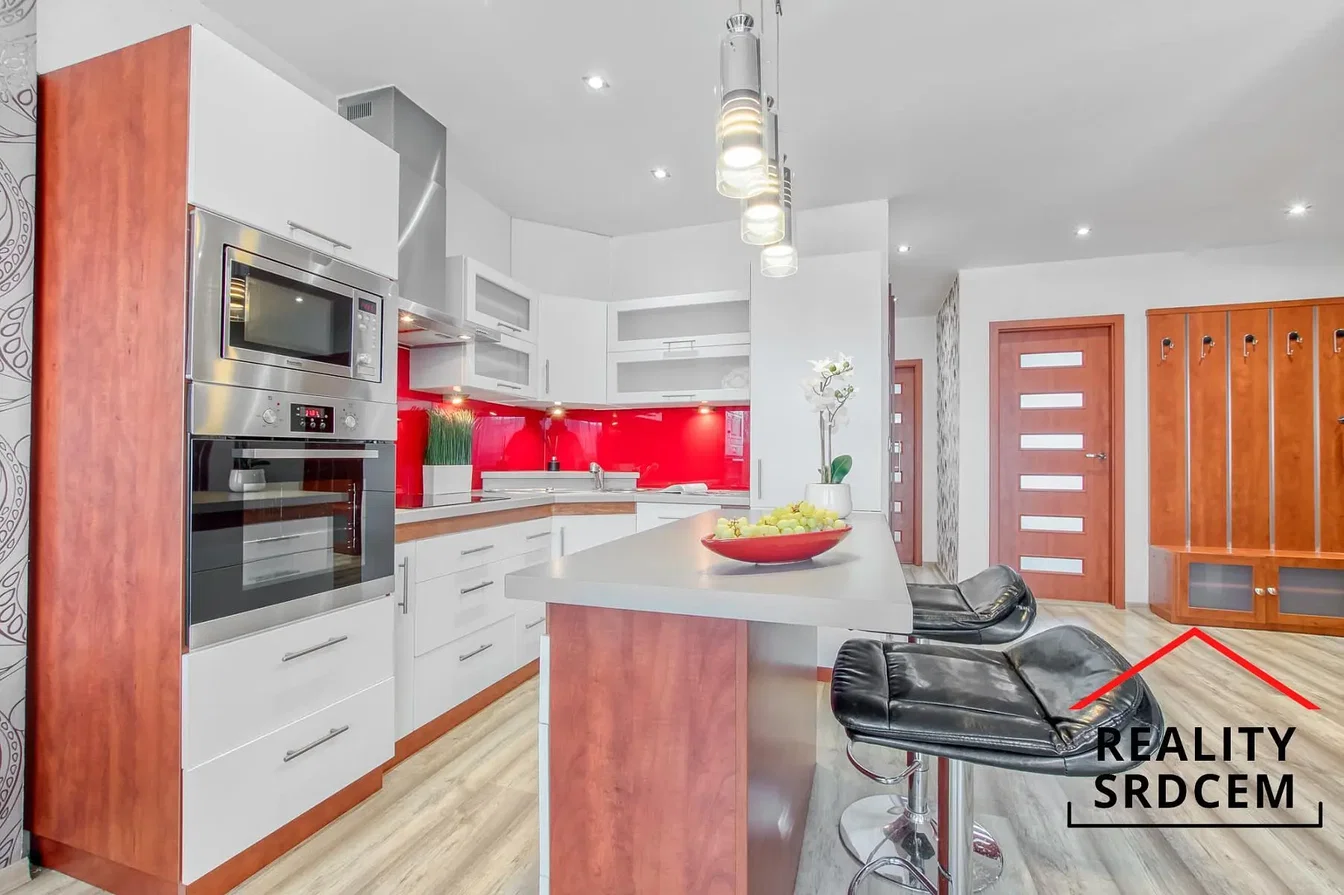 Kitchen; kitchen appliances, wood floor, natural light, modern style