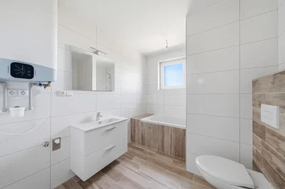 Bathroom; tile floor, wood floor, renovated, natural light