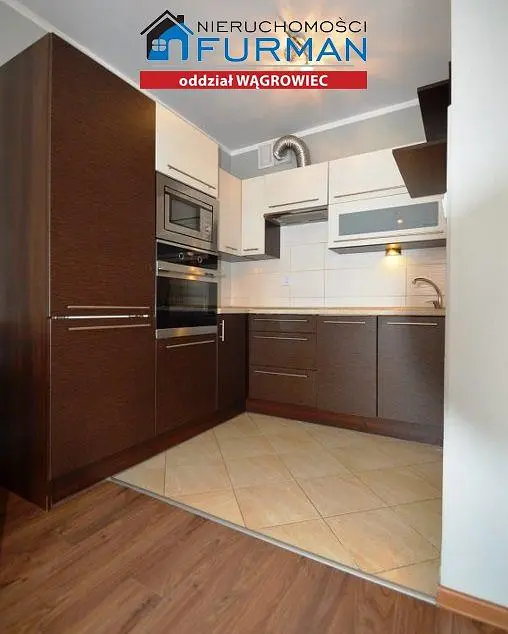 Kitchen; kitchen appliances, tile floor, wood floor