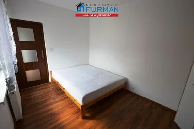 Bedroom; wood floor, natural light