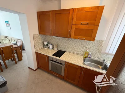 Kitchen; kitchen appliances, tile floor, natural light