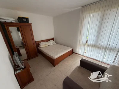 Bedroom; tile floor, natural light