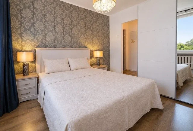 Bedroom; natural light, wood floor