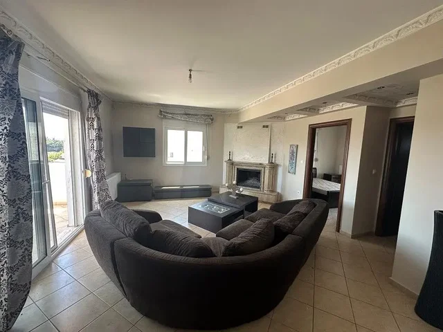 Living room; natural light, fireplace, tile floor