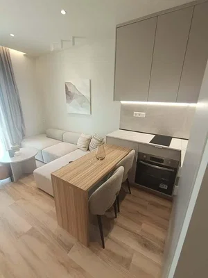 Salon; parquet, lumière naturelle, style moderne, électroménager