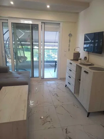 Living room; tile floor, natural light, modern style