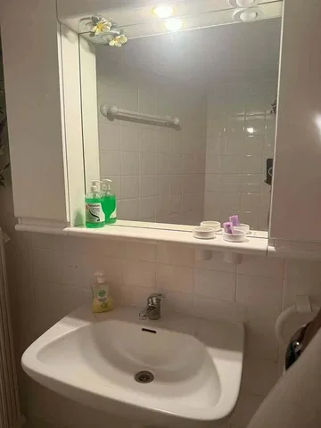 Bathroom; tile floor, needs renovation