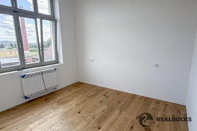 Bedroom; wood floor, natural light, needs renovation