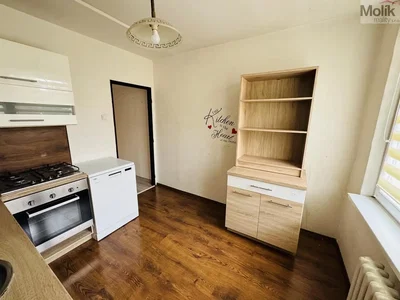 Kitchen; kitchen appliances, wood floor, natural light