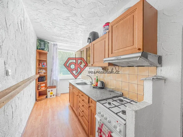 Kitchen; kitchen appliances, tile floor, wood floor, natural light