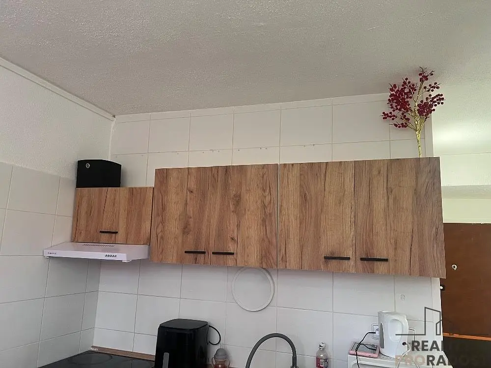 Kitchen; kitchen appliances, tile floor, needs renovation
