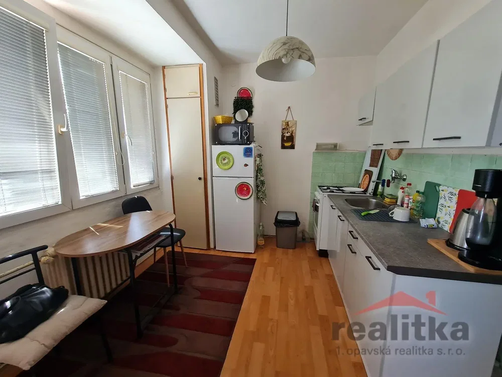 Kitchen; kitchen appliances, wood floor, natural light