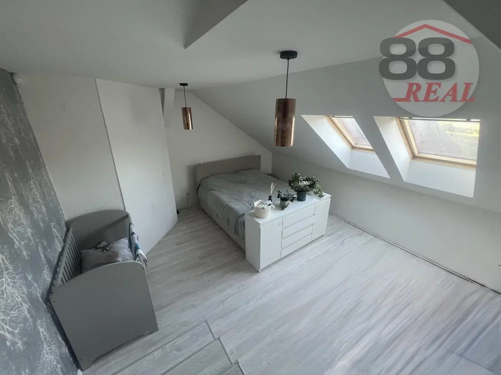 Slaapkamer; natuurlijk licht, houten vloer