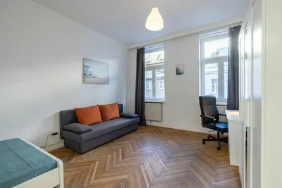 Bedroom; wood floor, natural light