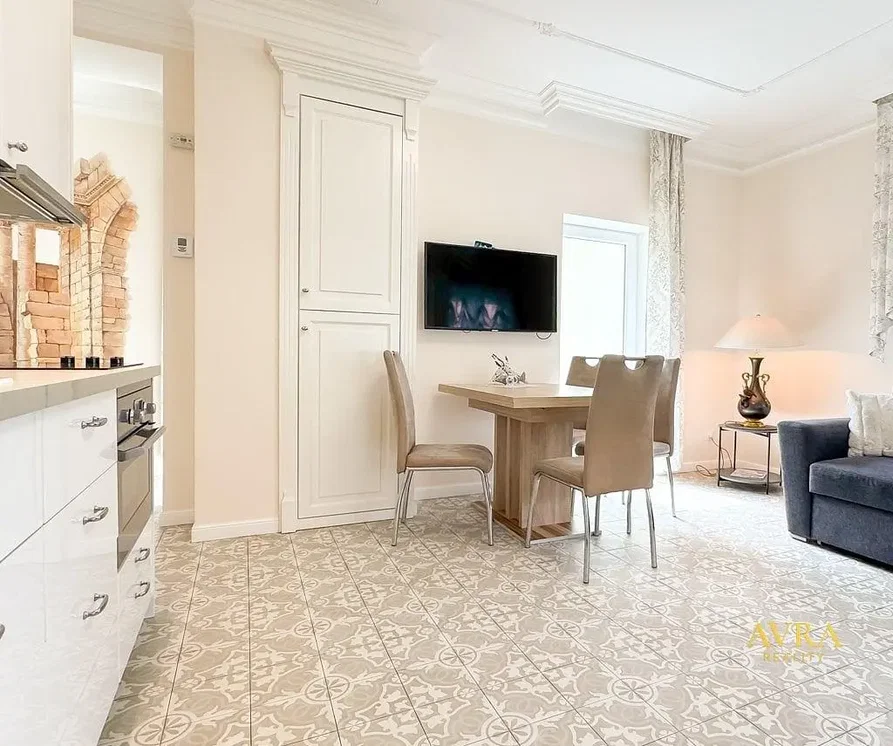 Kitchen; tile floor, kitchen appliances, natural light