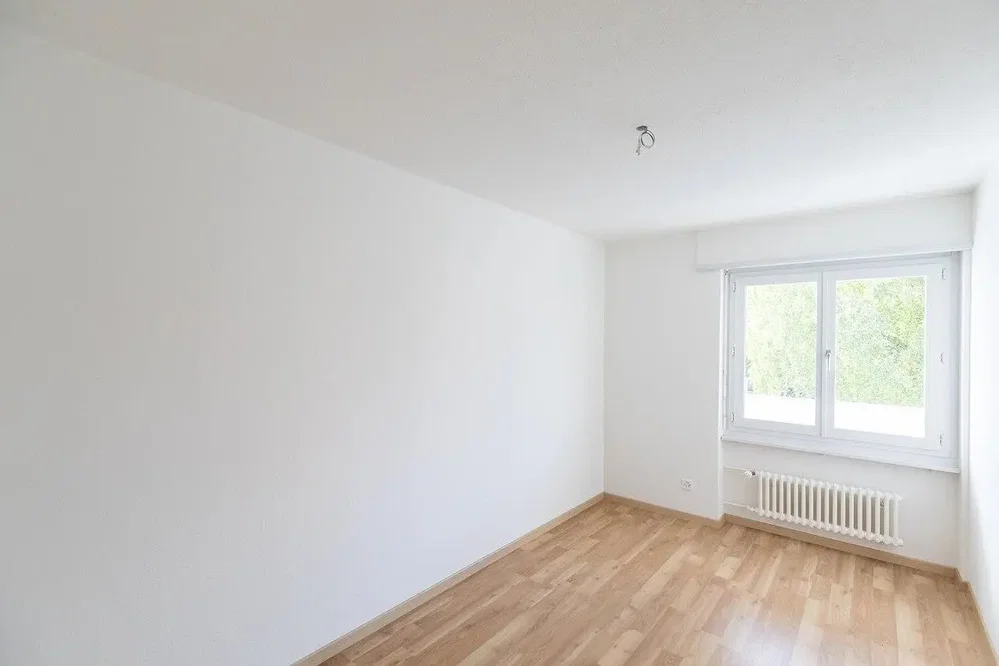 Bedroom; wood floor, natural light