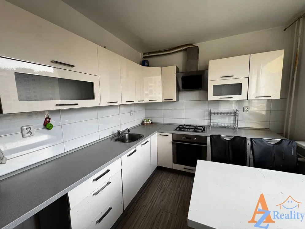 Kitchen; kitchen appliances, tile floor, wood floor