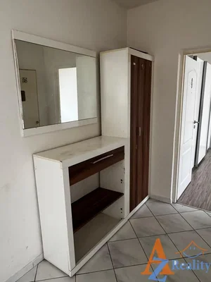 Cloakroom; tile floor, needs renovation