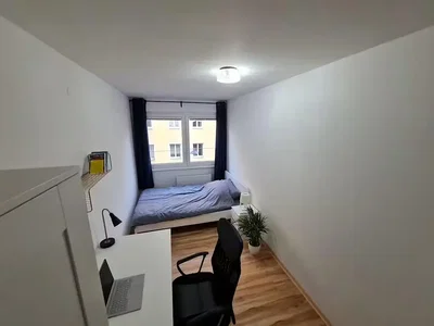 Slaapkamer; natuurlijk licht, houten vloer